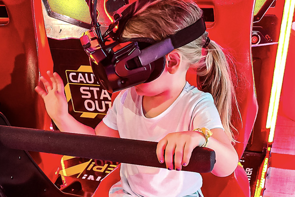 Girl playing King Kong VR